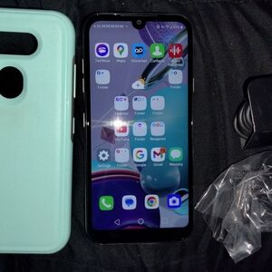 Black Smartphone with Mint Green Case